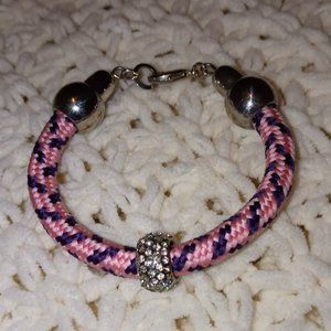 Rope/cord bracelet with beads.